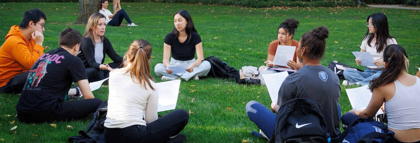 Columbia students having a class discussion outside on the Morningside campus