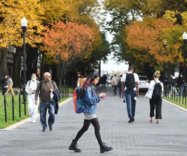 Columbia University student walking to classes across campus